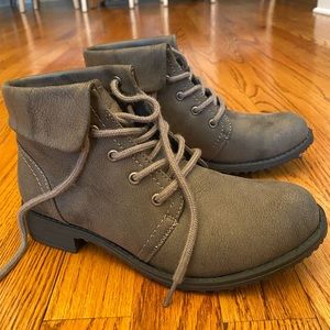 Gray leather ankle booties.
